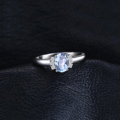 925 Sterling Silver 2.5ct Oval Sky Blue Topaz Ring with White CZ Side Stones