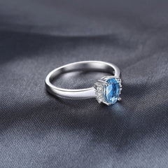 925 Sterling Silver 2.5ct Oval Sky Blue Topaz Ring with White CZ Side Stones